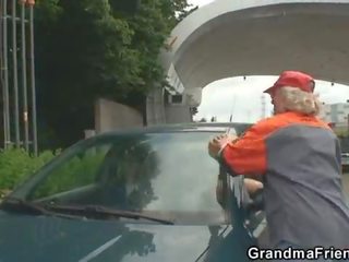 Slutty granny takes two cocks in the fields