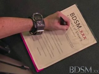 BDSM XXX Slave youngster licks Mistresses spit from the cage floor