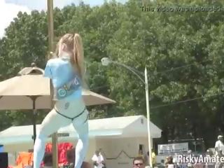 Amateur blonde is on the stage teasing the crowd