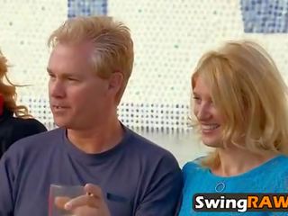 Cum-hungry wife drains guy's member during elite swinger party
