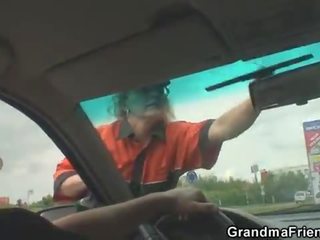 Old bitch swallows two cocks in fields