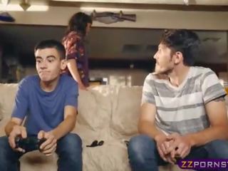 Awesome MILF helps out a gamer boy who has a huge erection