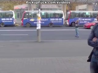 Busty redhead blowjob in a park