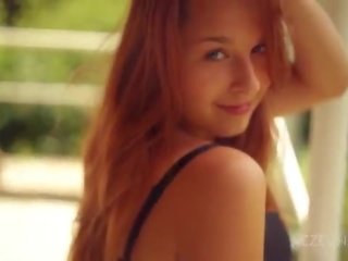 Attractive teen is playing